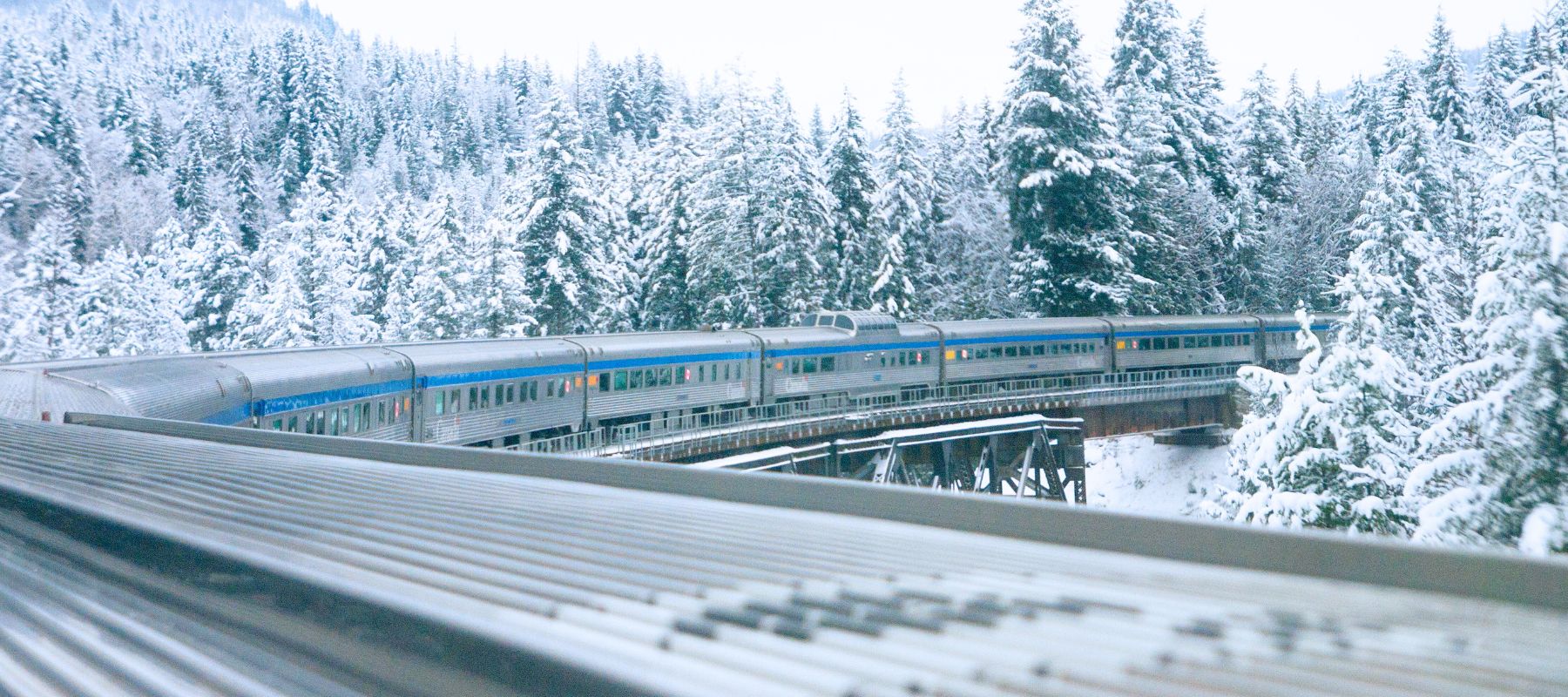 A remote wooden cabin in the deep Canadian winter forest